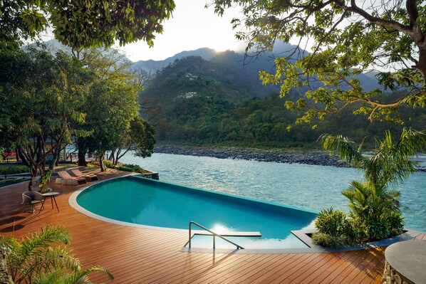 Outdoor pool, pool umbrellas, pool loungers