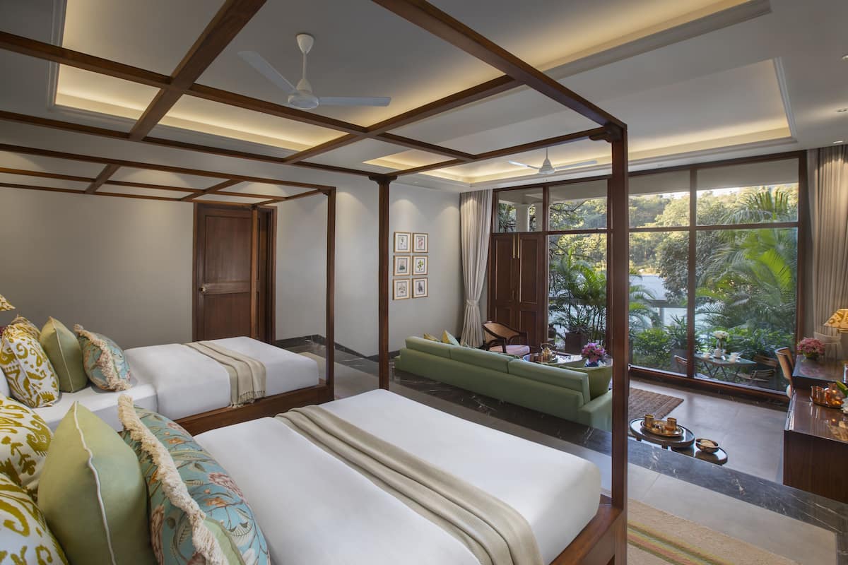 grand room, river view | minibar, desk, blackout curtains, iron/ironing board