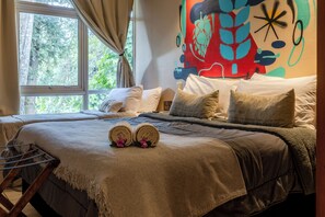 Habitació triple | Roba de llit d'alta qualitat, cobrellits i planxa i posts de planxar 