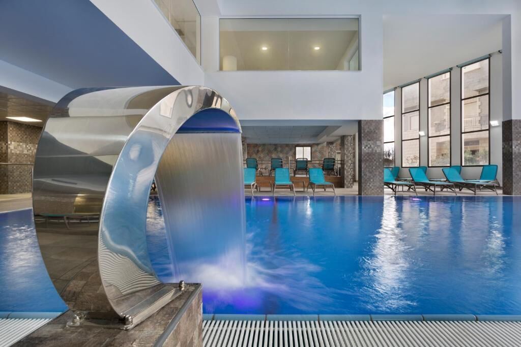 Indoor pool, open 7:00 AM to 10:00 PM, lifeguards on site