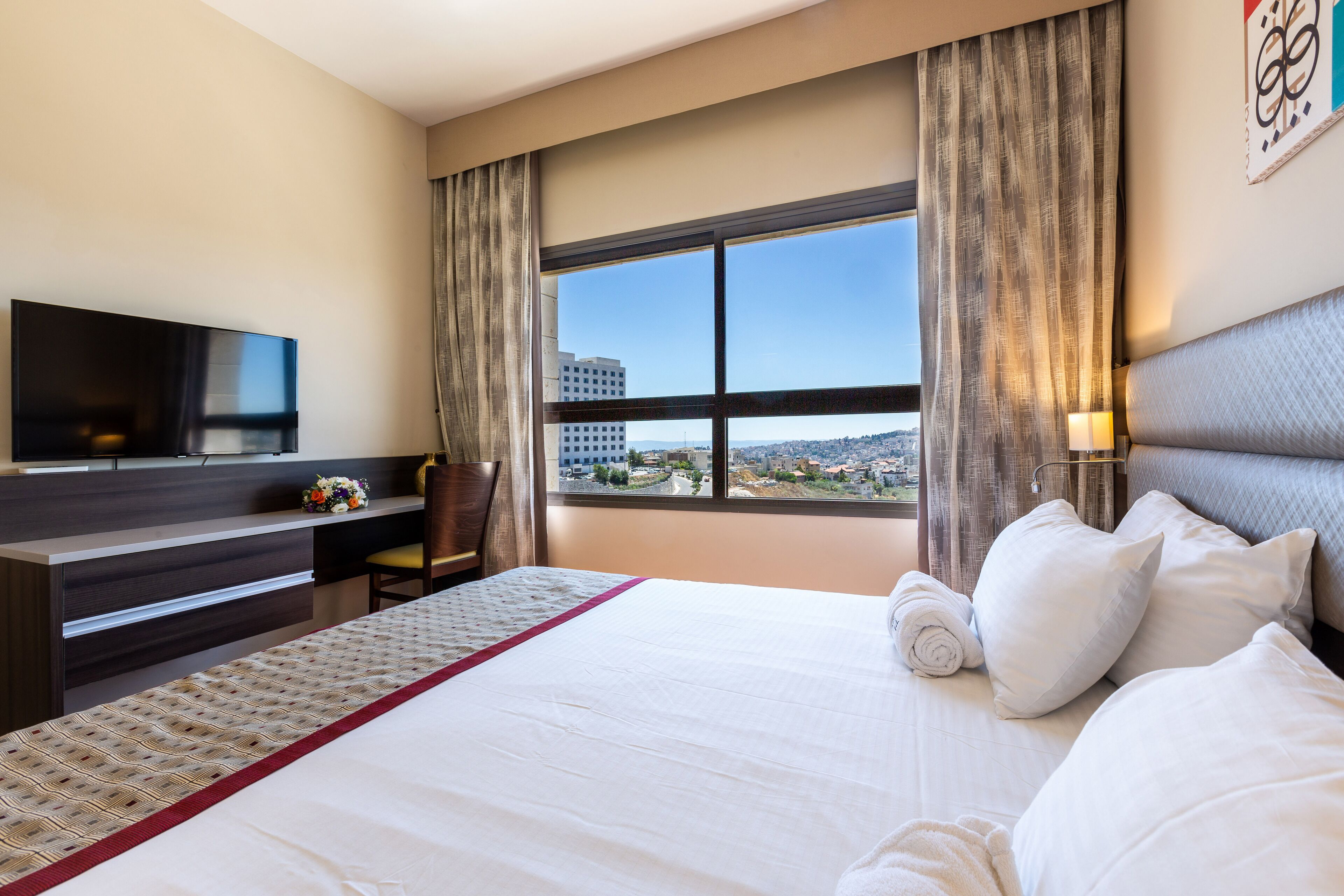 junior suite, city view | 1 bedroom, in-room safe, individually decorated, desk