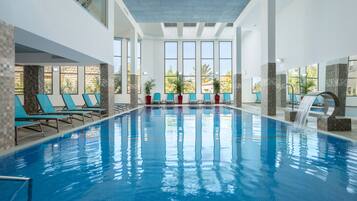Indoor pool, open 7:00 AM to 10:00 PM, lifeguards on site