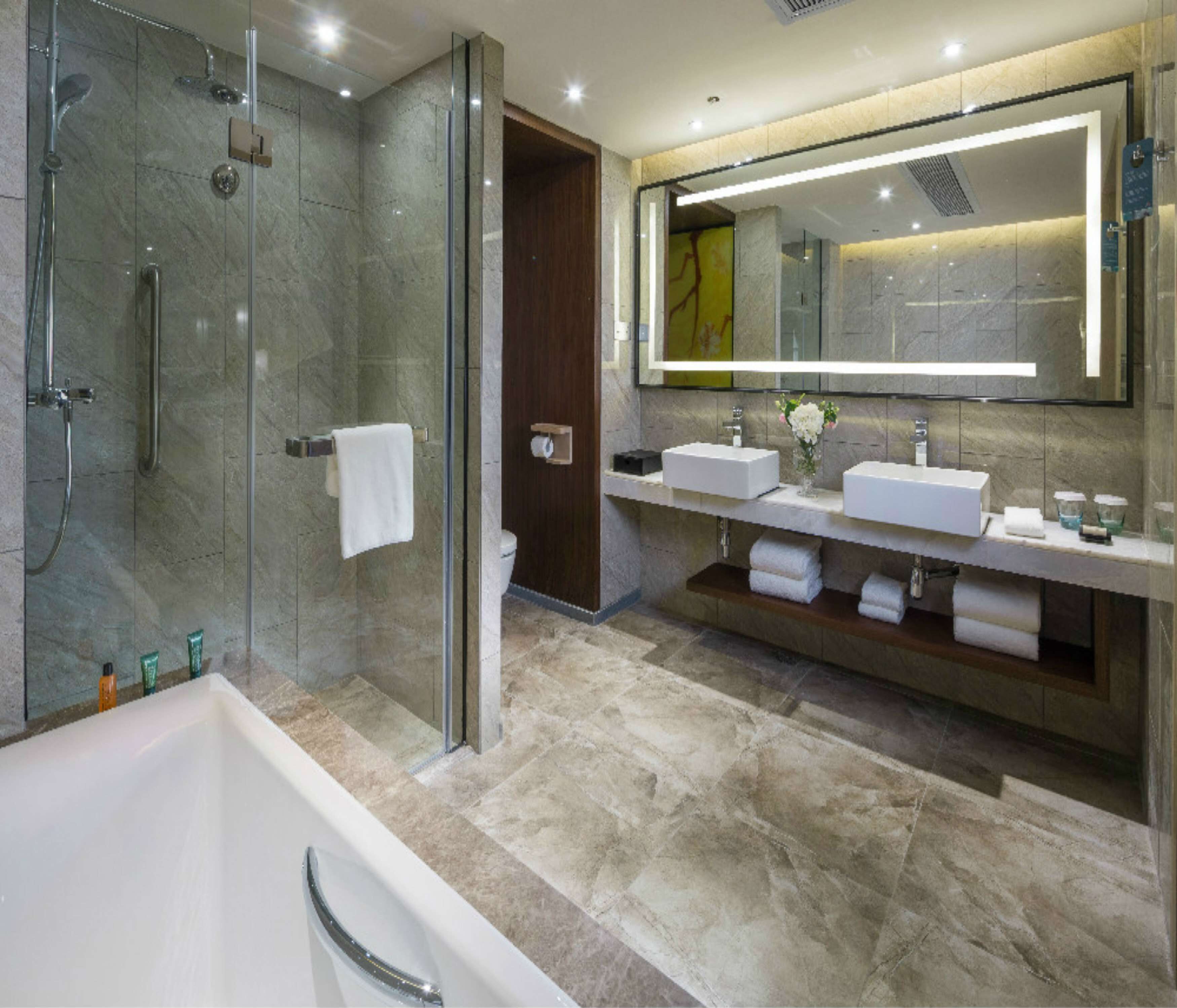 suite, 1 bedroom | bathroom | separate bathtub and shower, rainfall showerhead, free toiletries