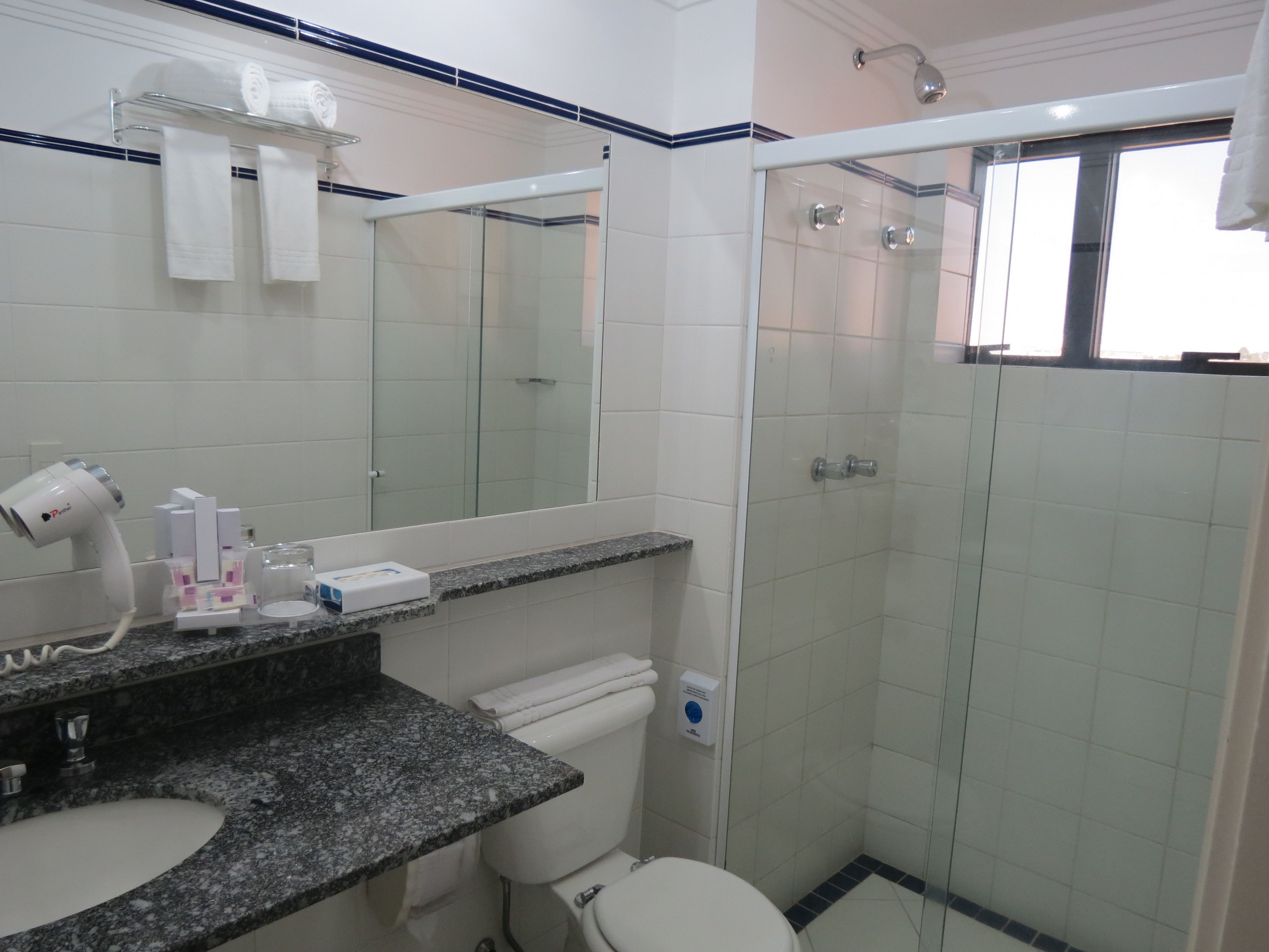 shower, free toiletries, hair dryer, towels