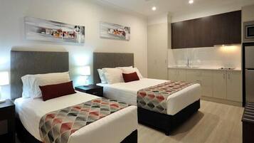 Spacious Twin Studio Apartment | Premium bedding, desk, blackout curtains, soundproofing