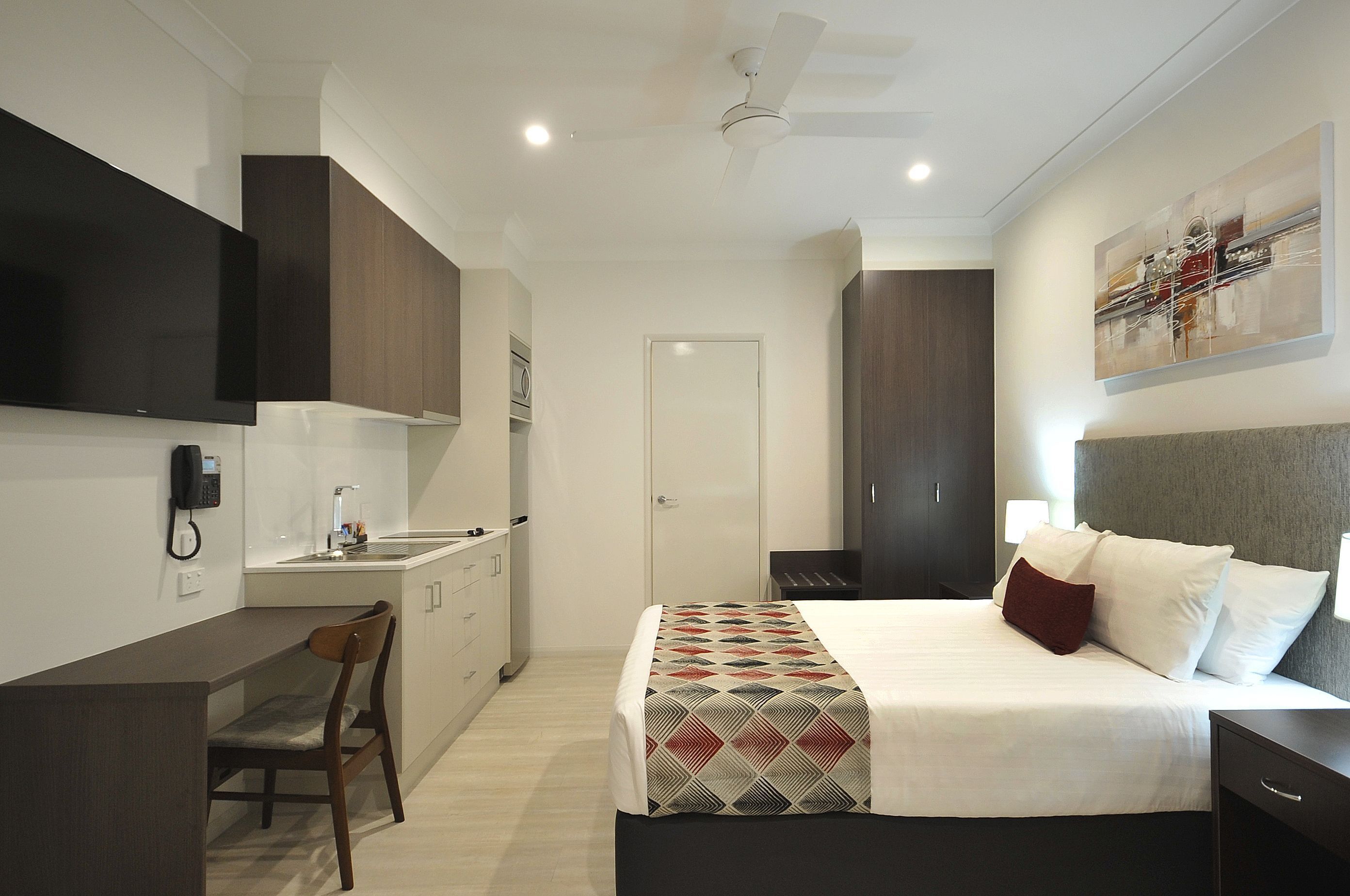 Premium bedding, desk, blackout drapes, soundproofing