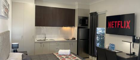 Premium bedding, desk, blackout curtains, soundproofing