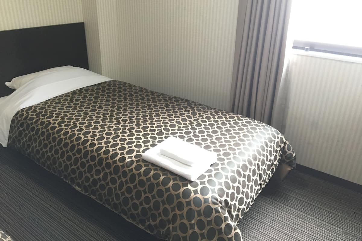 Business Single Room, 1 Bedroom | Free WiFi, bed sheets