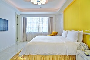 Suite Deluxe | Minibar, caja fuerte, escritorio y cortinas opacas