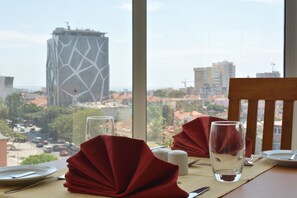 Breakfast, lunch, dinner served; local and international cuisine 