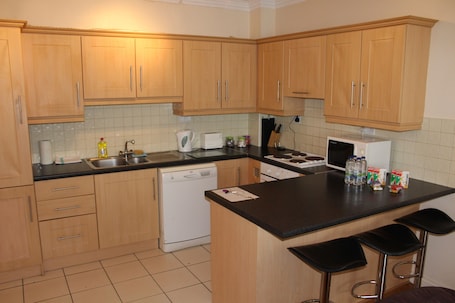Apartment, 2 Bedrooms | Private kitchen | Full-size fridge, microwave, oven, stovetop