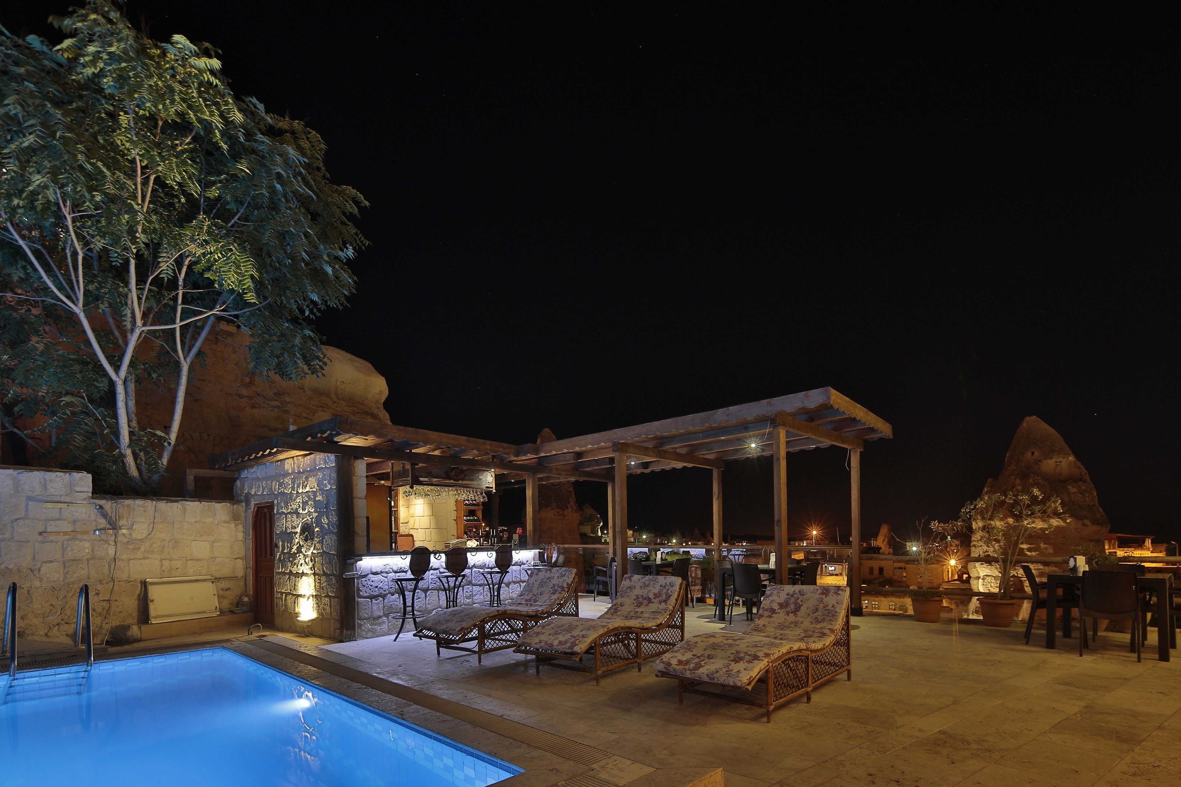 outdoor pool, pool umbrellas, pool loungers