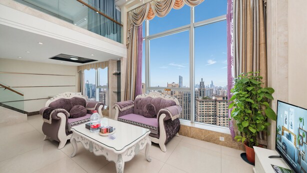 Suite Deluxe, 1 habitación | Área de sala de estar