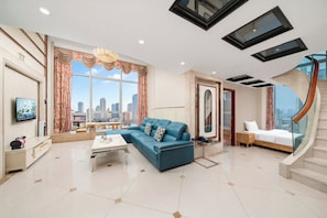 Deluxe-Suite, 3 Schlafzimmer | Wohnbereich