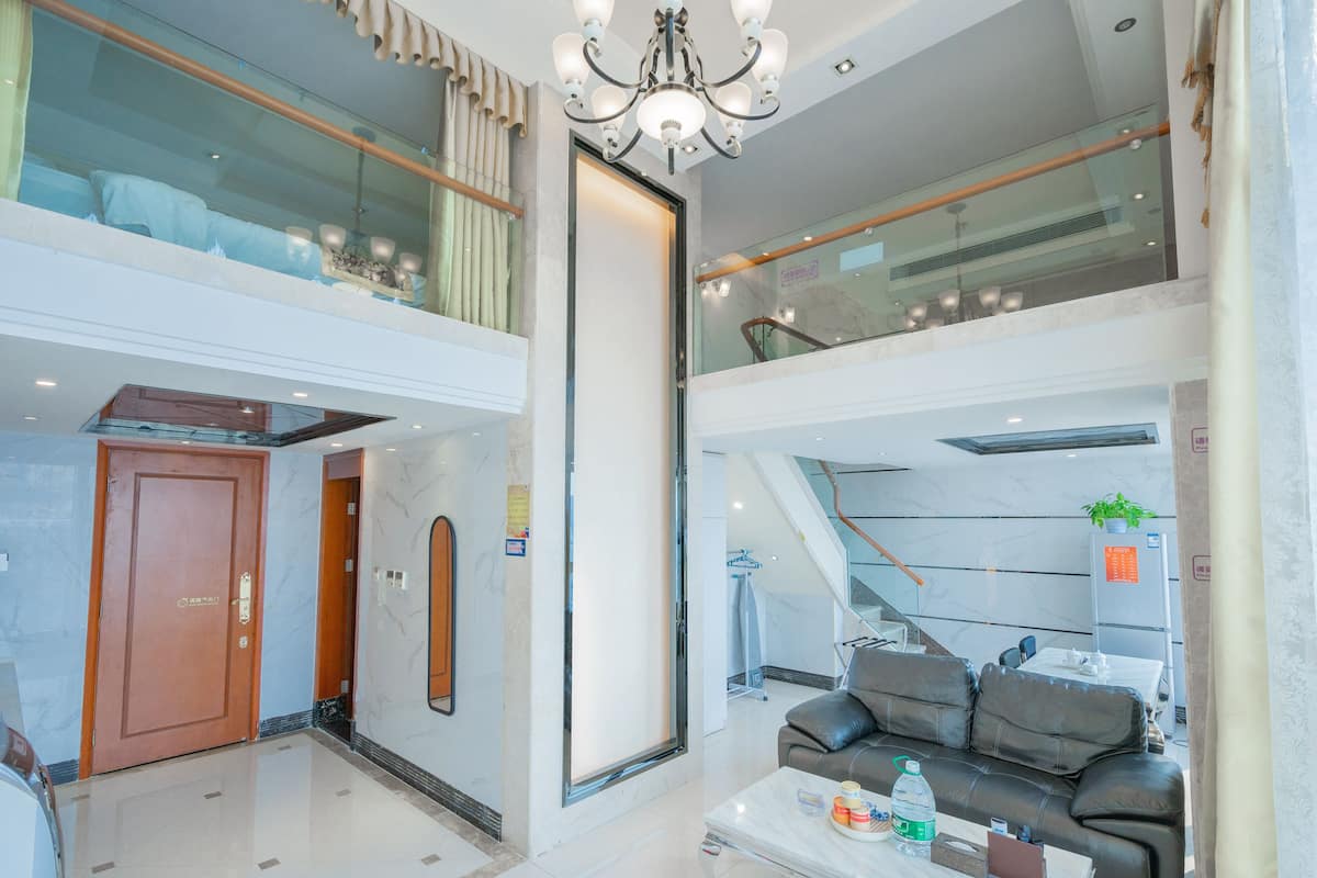 Duplex Deluxe Two-bedroom Suite | Minibar, in-room safe, blackout drapes, iron/ironing board