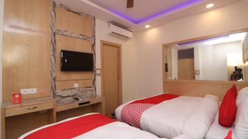 Quarto triplo luxo, 1 quarto, para não fumantes | Vista do quarto