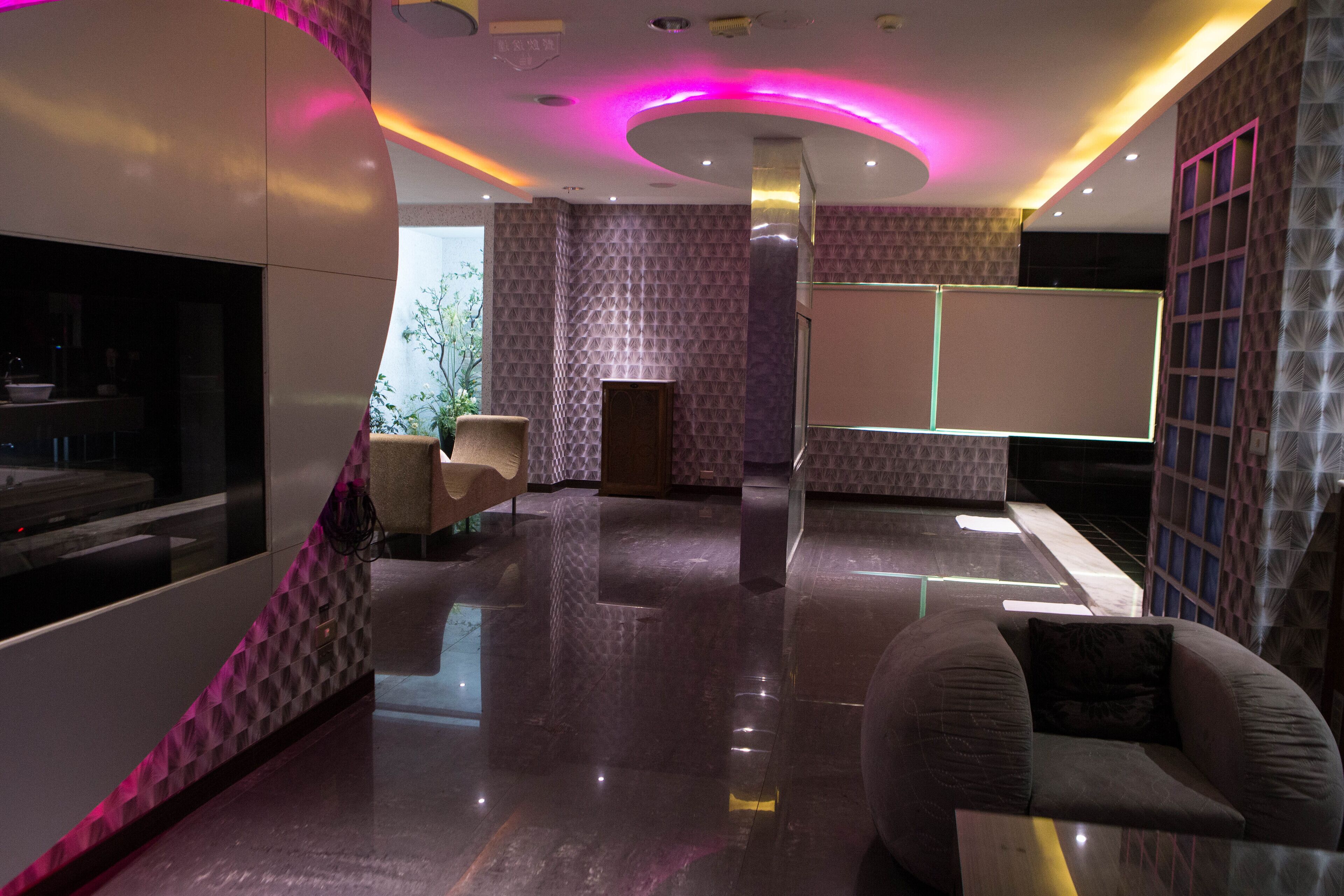 flagship suite (check in time starts from 6pm) | living area | lcd tv