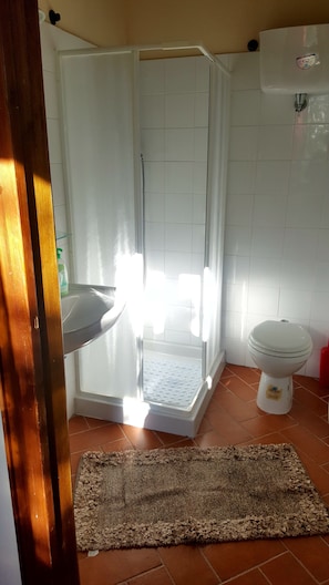 Honeymoon Apartment | Bathroom | Hair dryer, towels