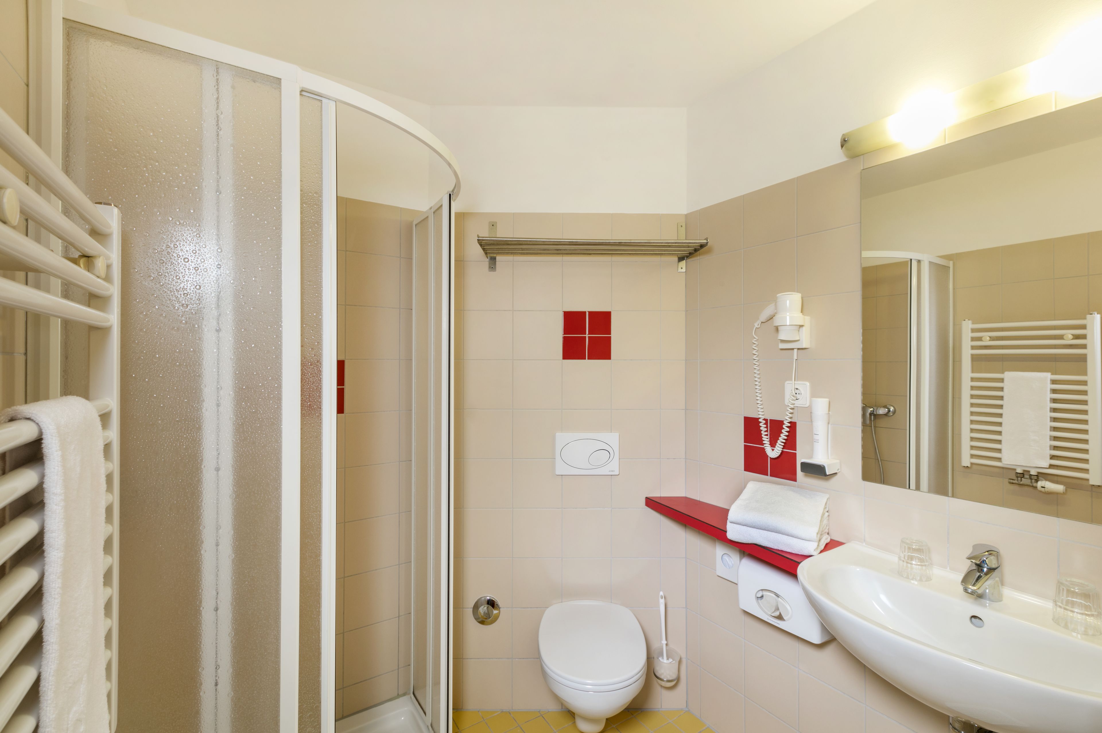 shower, hair dryer, bathrobes, towels