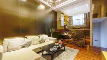 Quarto duplo executivo | Sala de estar | TV de tela plana