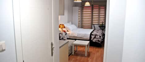 Desk, iron/ironing board, cribs/infant beds, rollaway beds