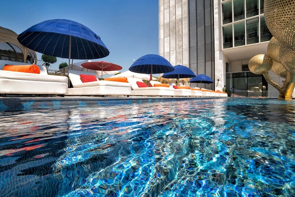 Indoor pool, seasonal outdoor pool, pool umbrellas, sun loungers