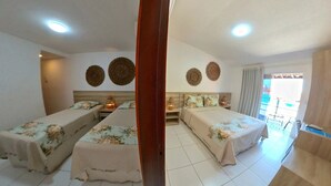 A hotel room with two beds, a wooden wardrobe, a TV, and a balcony with a view. - Pousada Mar e Brisa (Natal)