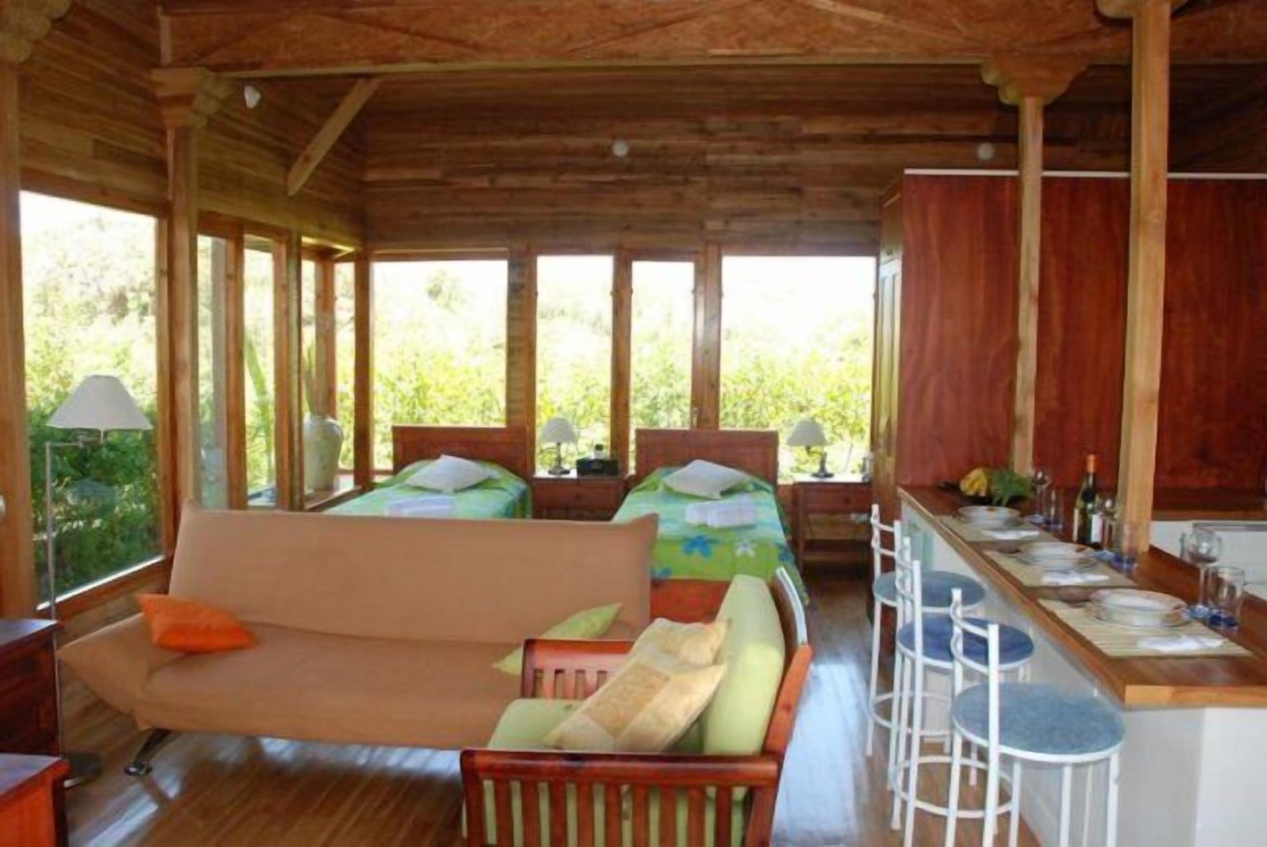 Romantic Studio Suite, 1 Bedroom, Kitchen, Garden Area | Living area | Flat-screen TV, DVD player, iPod dock, pay movies