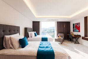 Suite, sudut (Family Twin) | Seprai premium, selimut bulu angsa, minibar, dan brankas