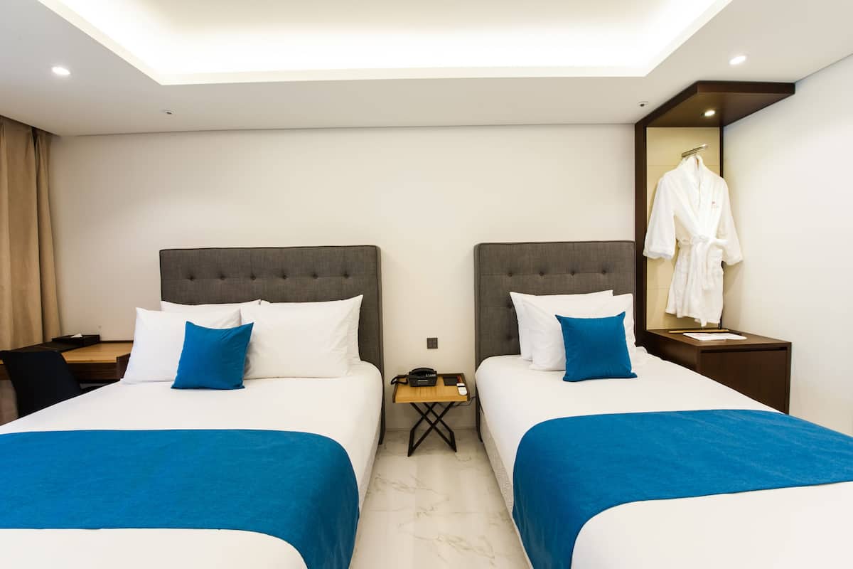 Ropa de cama de alta calidad, edredón y minibar