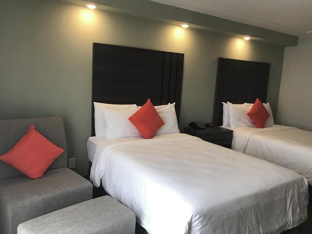 Premium bedding, desk, blackout drapes, iron/ironing board