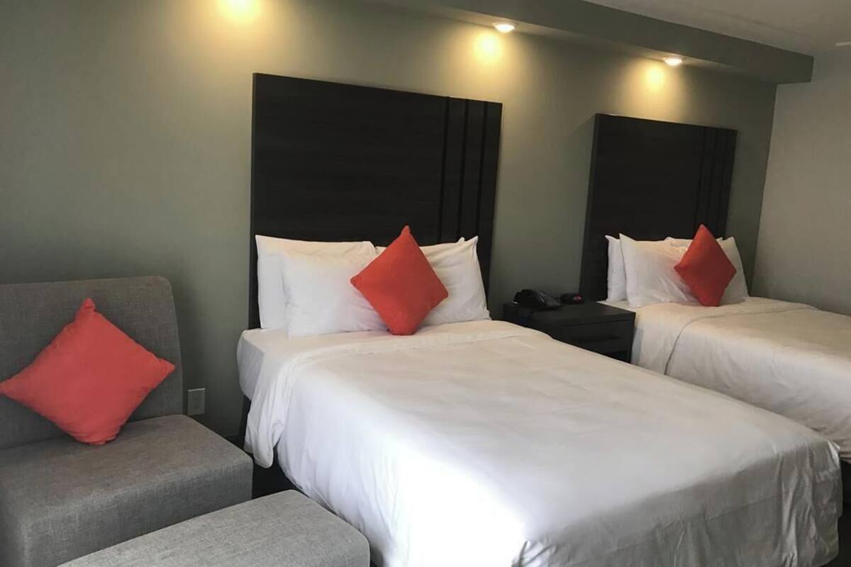 Premium bedding, desk, blackout drapes, iron/ironing board