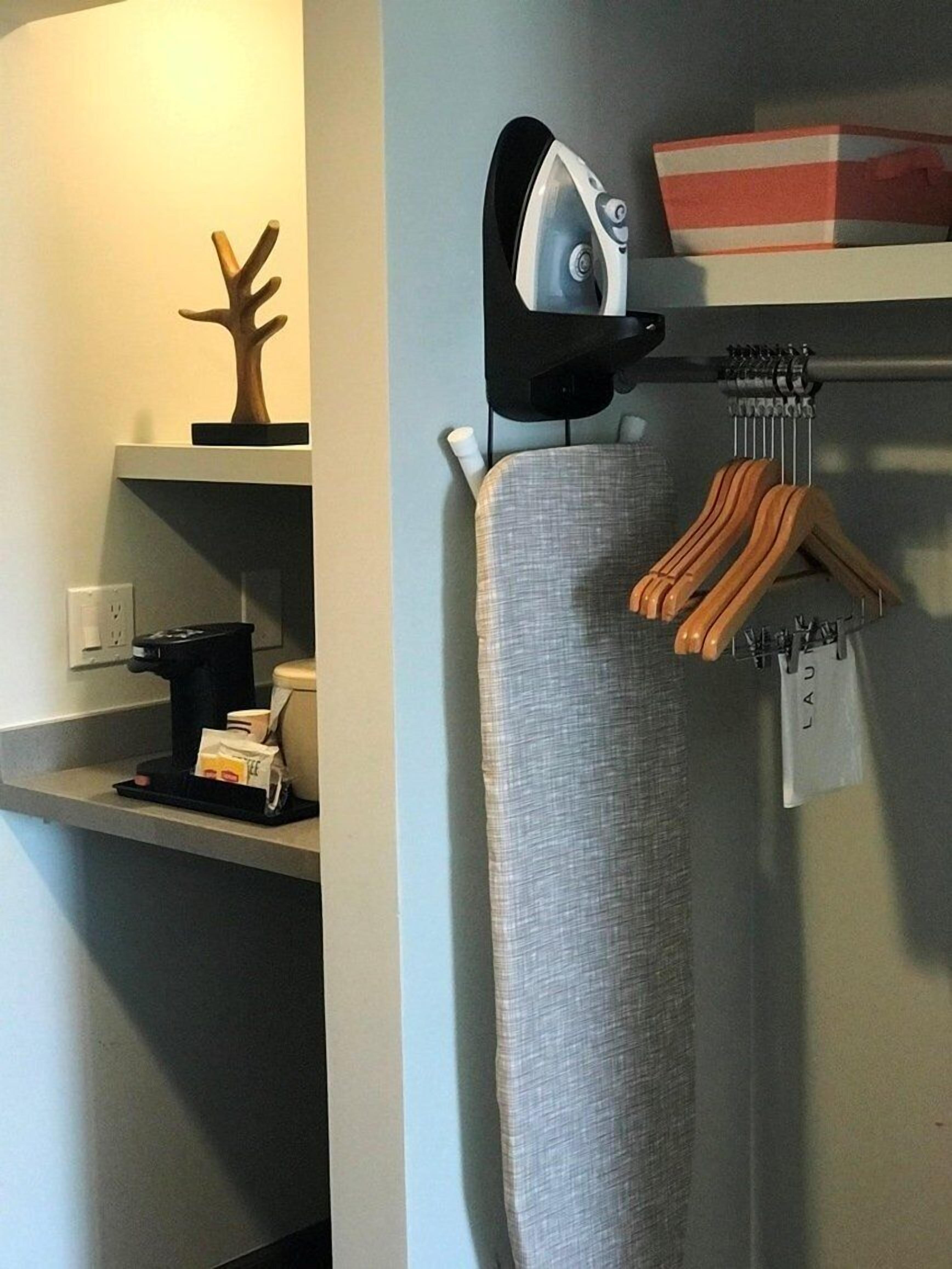 premium bedding, desk, blackout curtains, iron/ironing board