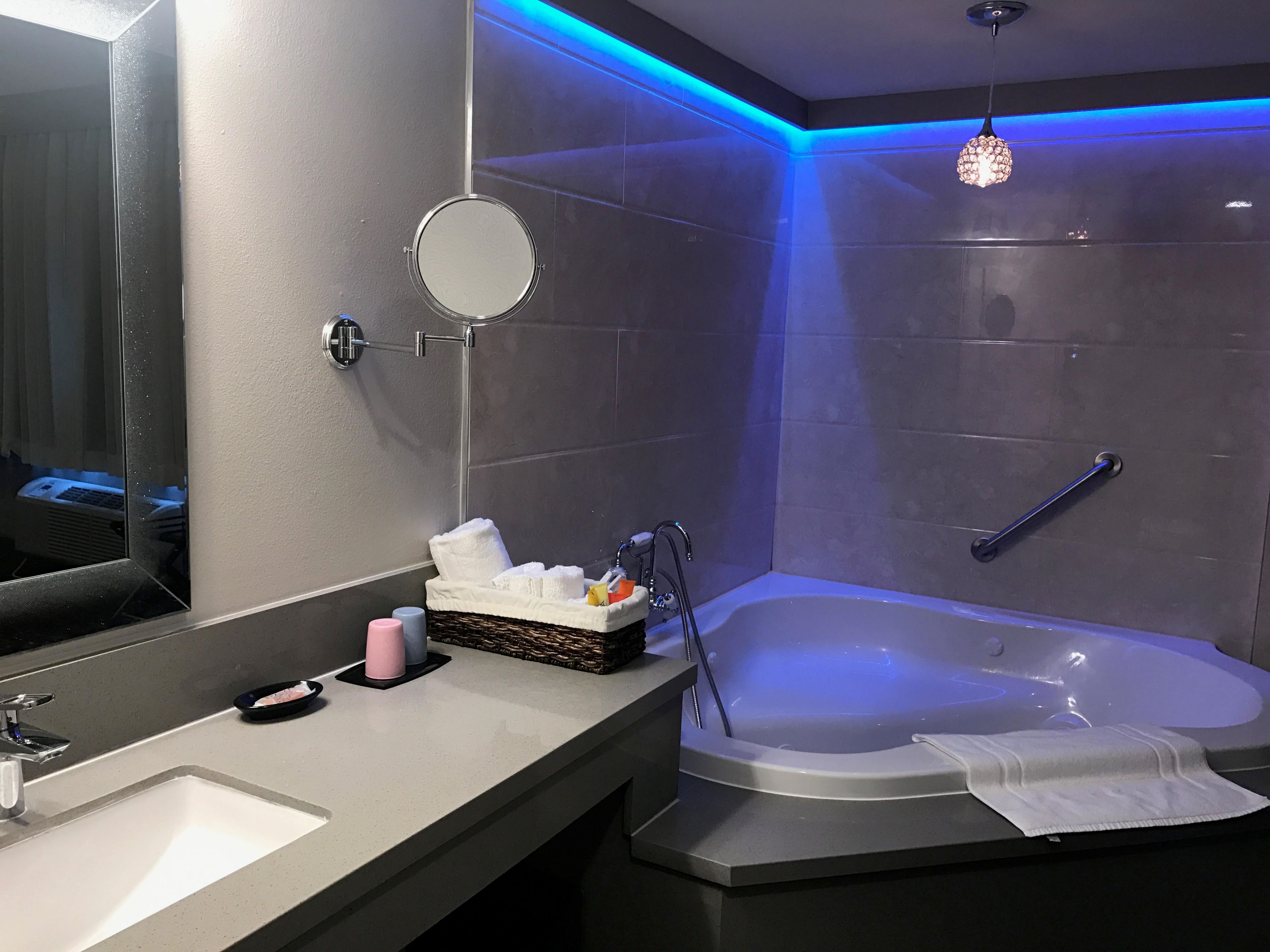 luxury room, 1 king bed, non smoking, jetted tub | premium bedding, desk, blackout curtains, iron/ironing board