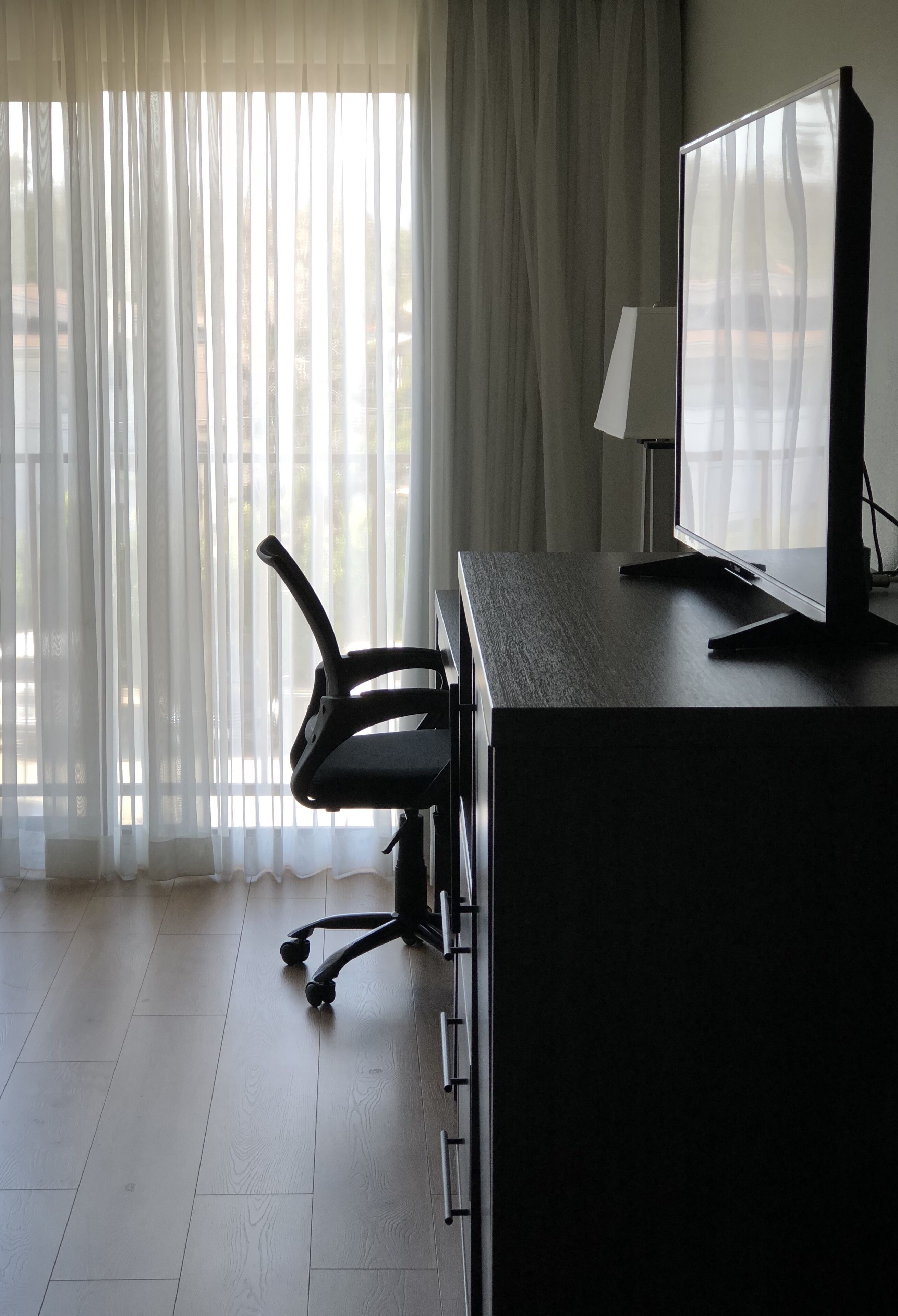 premium bedding, desk, blackout curtains, iron/ironing board