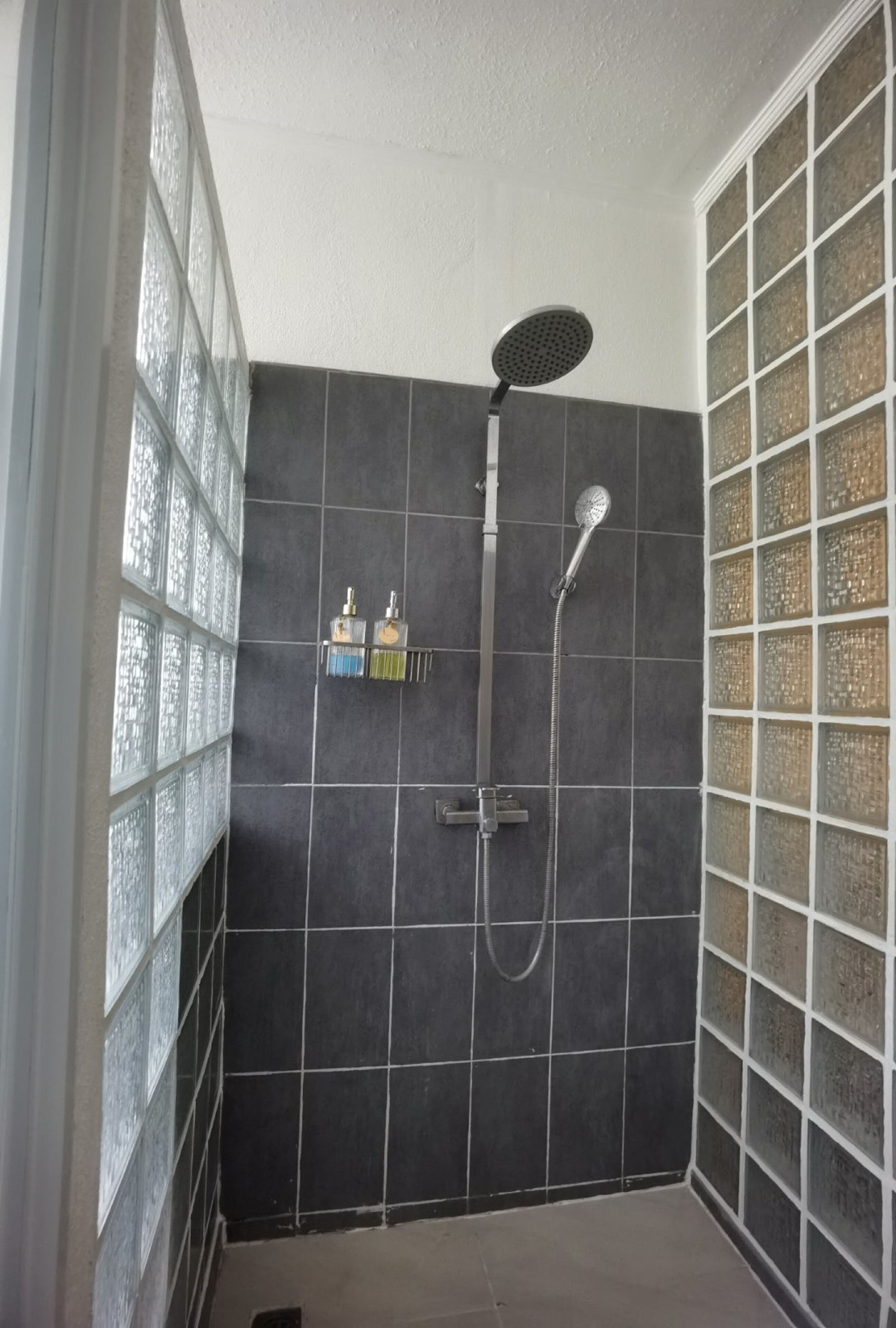 family room | bathroom | shower, free toiletries, hair dryer, bidet
