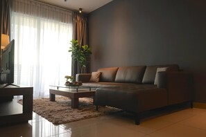 Appartement familial, 3 chambres | Salle de séjour | Téléviseur ACL