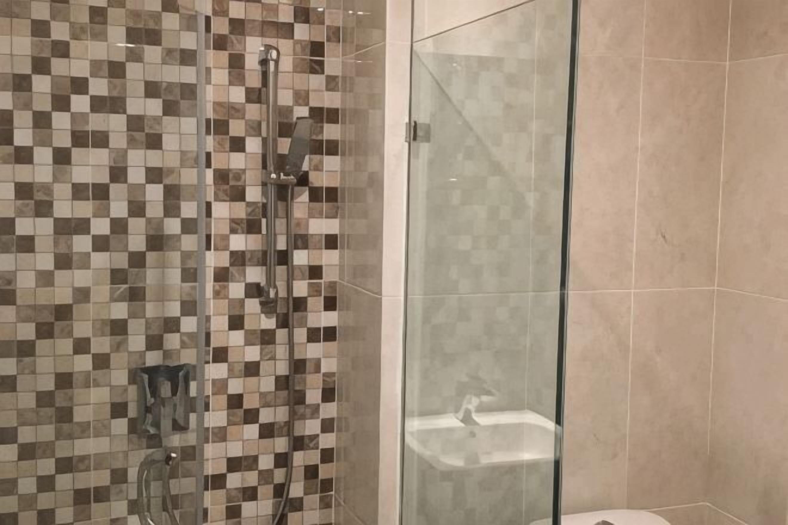 Bathroom | Shower, free toiletries, hair dryer, slippers