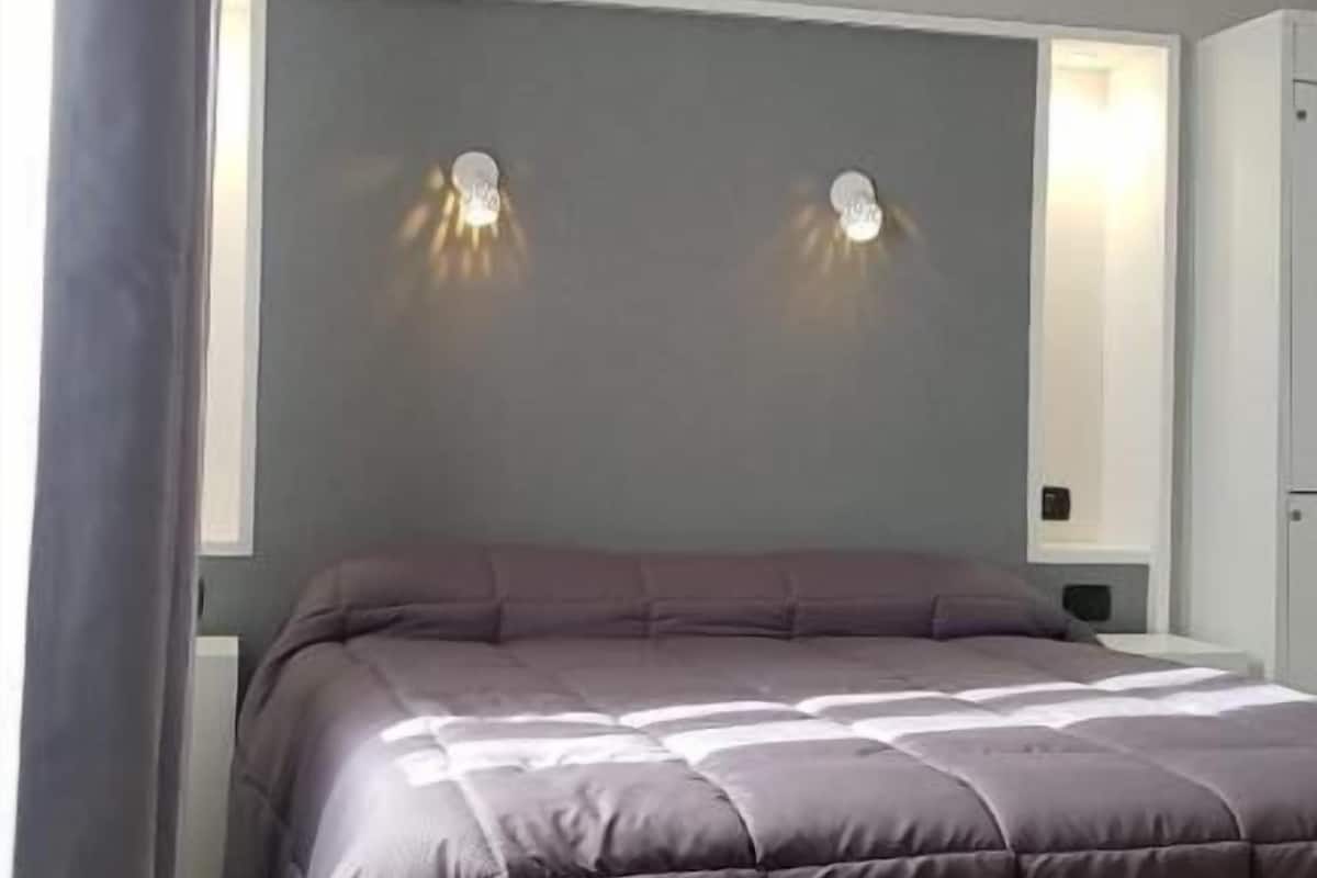 family room | in-room safe, individually furnished, desk, iron/ironing board