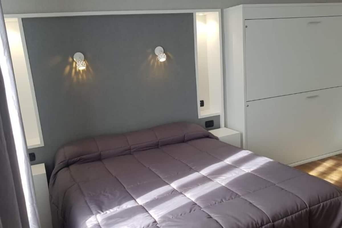 family room | in-room safe, individually furnished, desk, iron/ironing board