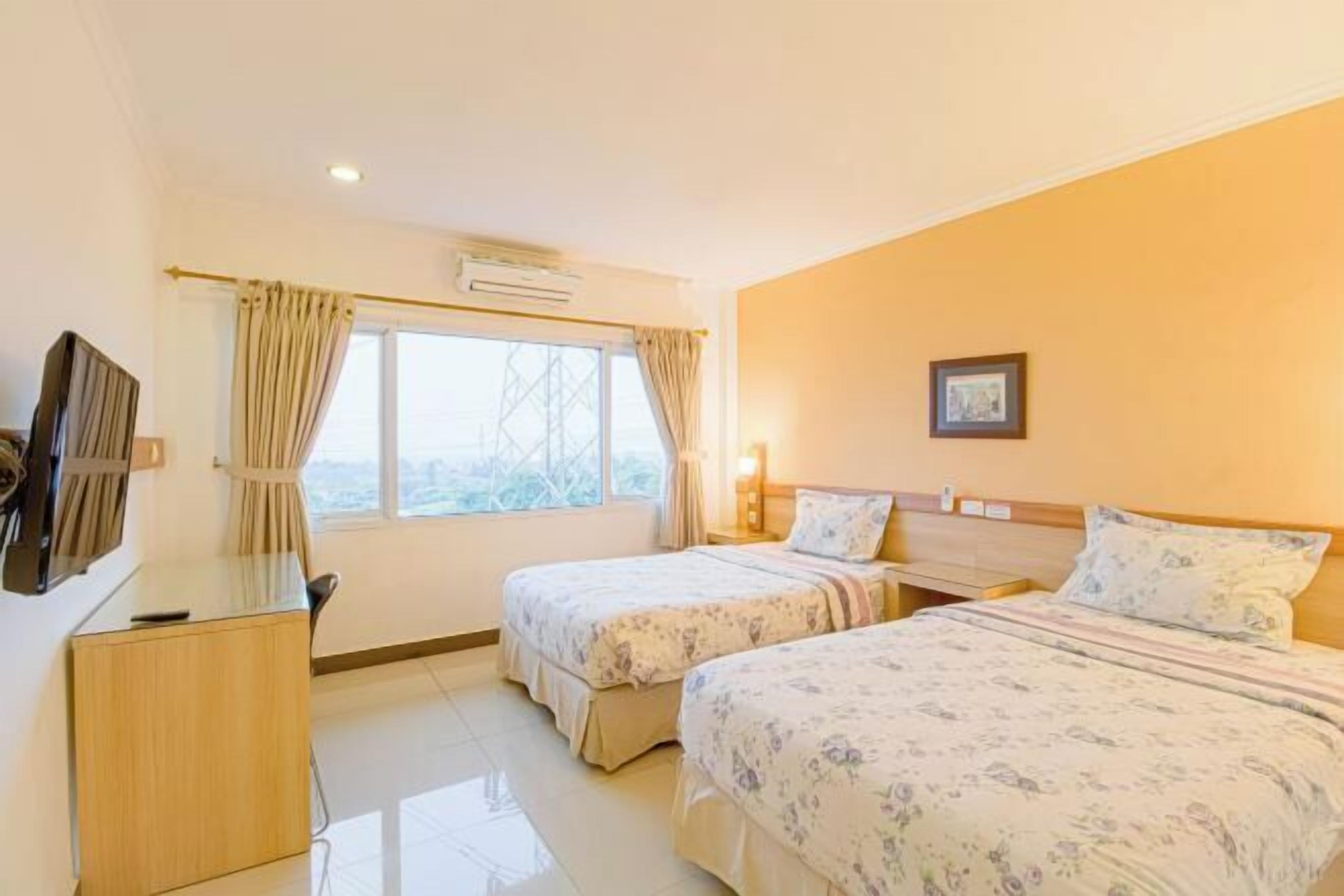 Desk, laptop workspace, free WiFi, bed sheets