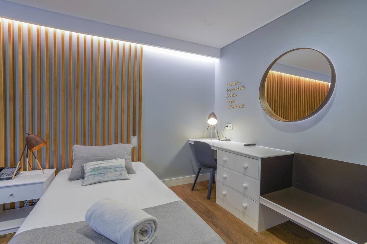 Desk, blackout curtains, free cots/infant beds, free WiFi