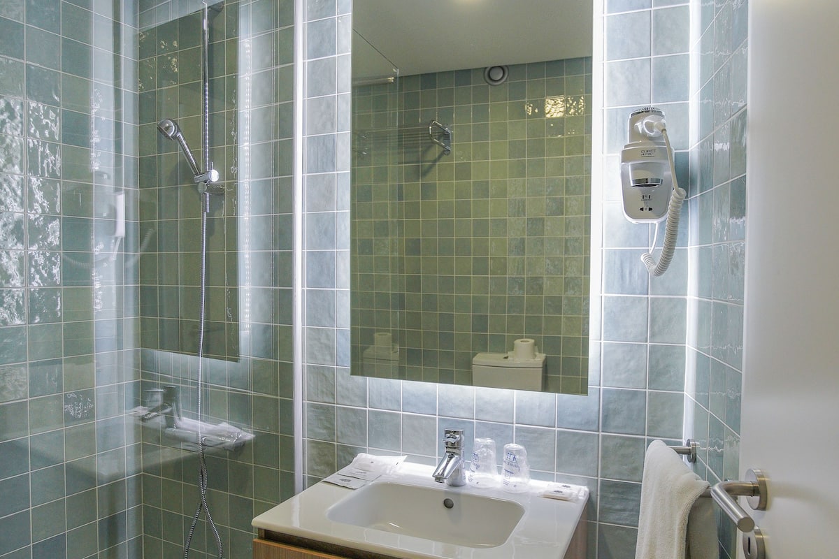 free toiletries, hair dryer, bidet, towels