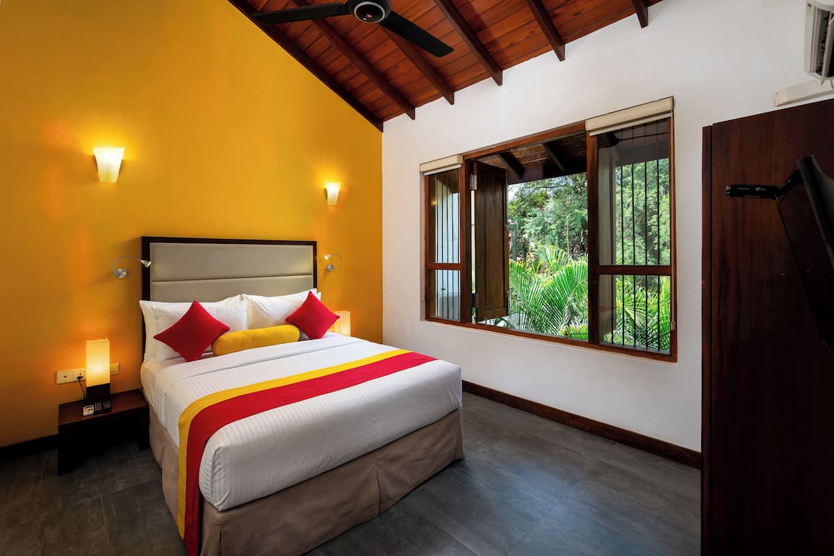 Deluxe Suite, 2 Bedrooms, Garden View | 1 bedroom, in-room safe, desk, laptop workspace