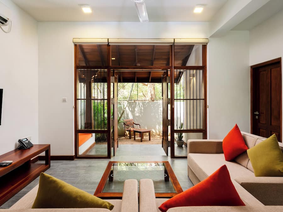 Deluxe Suite, 2 Bedrooms, Garden View | Living area