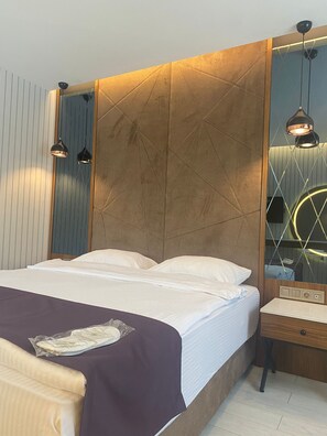 Deluxe-Zimmer | Minibar, Zimmersafe, individuell dekoriert, kostenloses WLAN