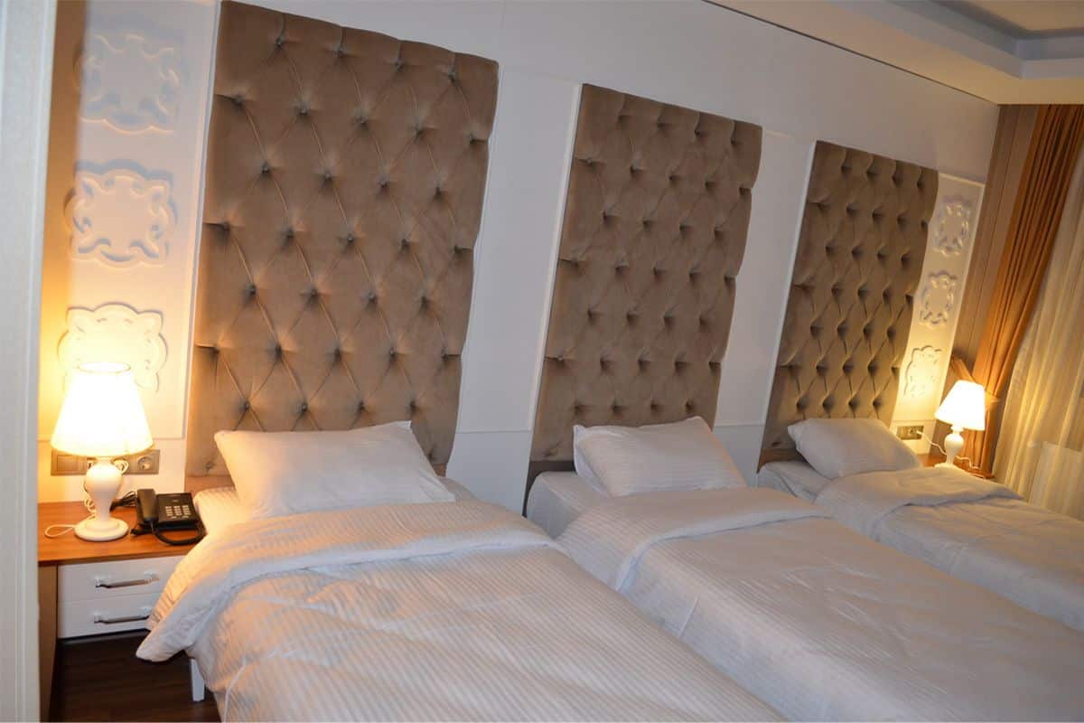 Standard-Dreibettzimmer | 2 Schlafzimmer, Minibar, Zimmersafe, individuell dekoriert