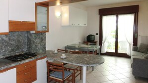 Apartment, 2 Bedrooms | Living area | Flat-screen TV - Hemingway (Lignano Sabbiadoro)