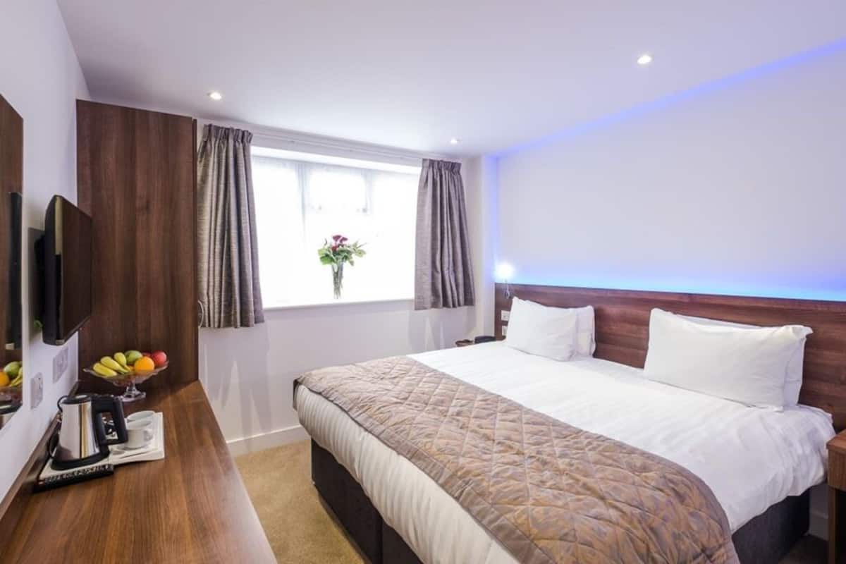 Kamer, 1 twee- of 2 eenpersoonsbedden, en-suite badkamer | 1 slaapkamer