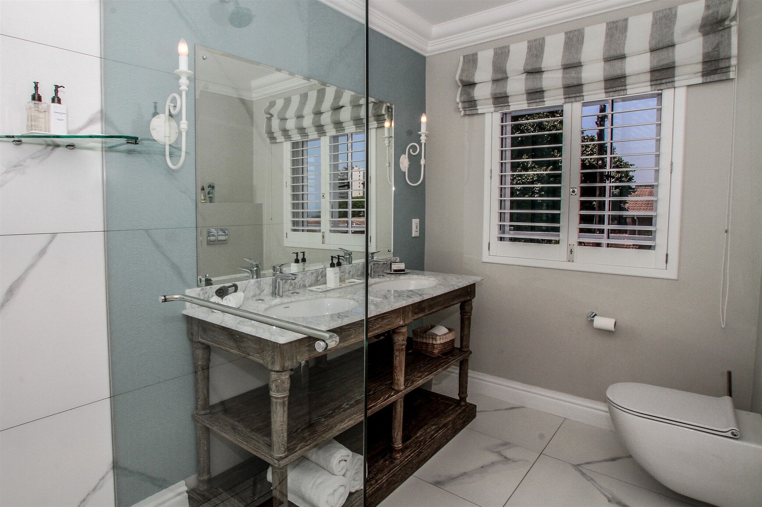 Ocean | Bathroom | Designer toiletries, hair dryer, slippers, towels